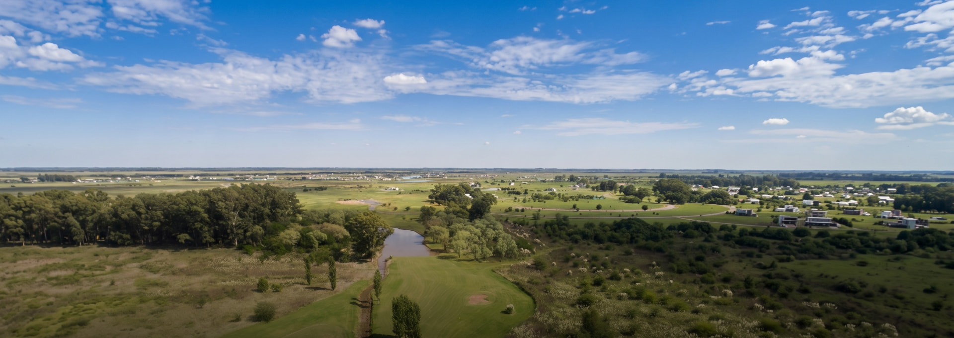 Panoramic view of Eidico neighborhoods, green spaces and lakes